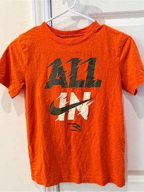 Nike Kids Orange 'All In' Graphic Tee with Black & White Logo